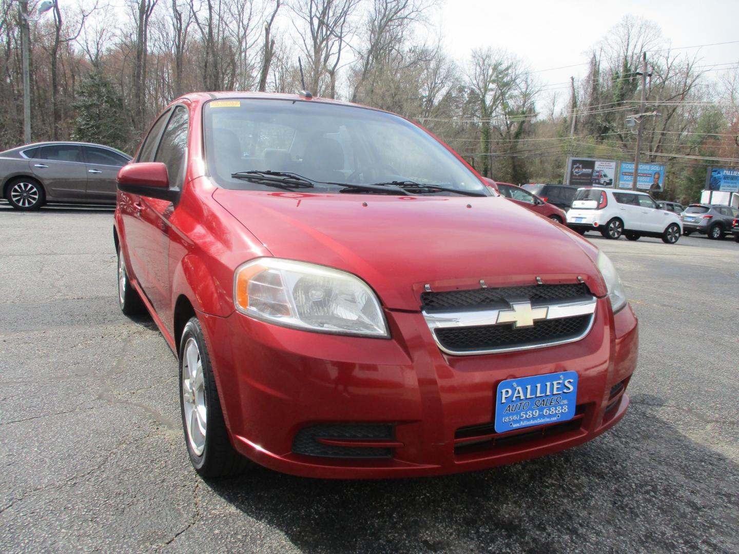 2011 RED Chevrolet Aveo (KL1TD5DE6BB) with an 1.6L L4 DOHC 16V engine, AUTOMATIC transmission, located at 540a Delsea Drive, Sewell, NJ, 08080, (856) 589-6888, 39.752560, -75.111206 - Photo#8